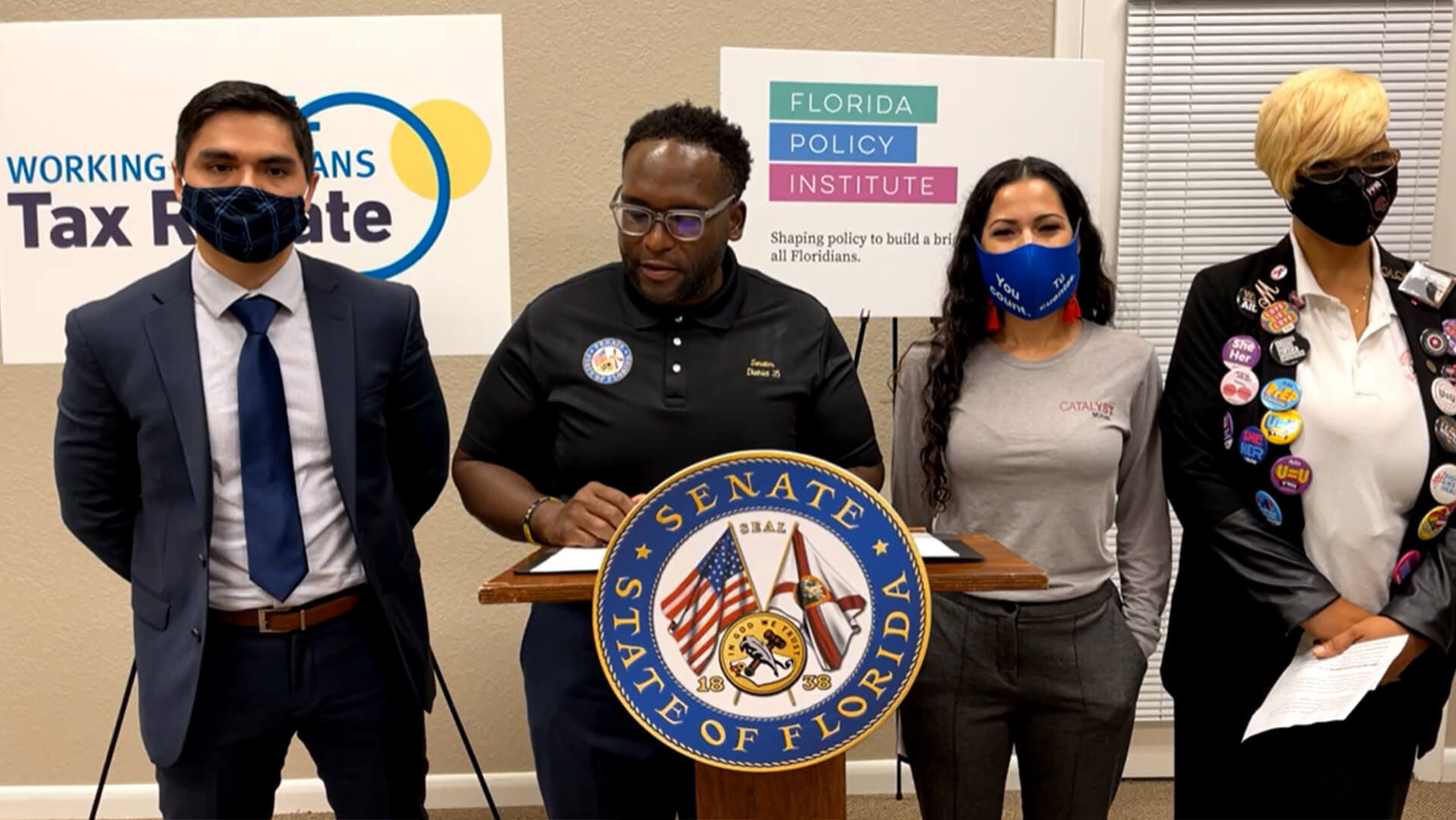 Press conference for the introduction of the Working Floridians Tax Rebate bill, 2021. Senator Shevrin Jones (second from left) with representatives (left to right) from Florida Policy Institute, Catalyst Miami, and the Miami community