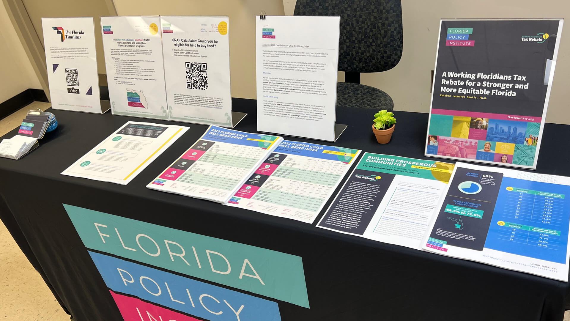Florida Policy Institute sharing policy resources at the United Way Suncoast Taxathon event with all-day free tax preparation and community resources, 2023
